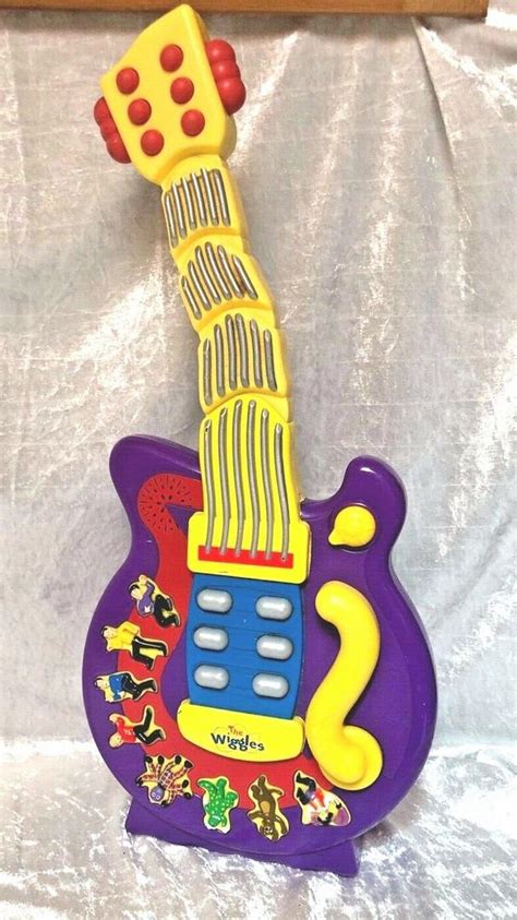 The Wiggles Guitar Purple Electronic Musical Dancing Guitar Used