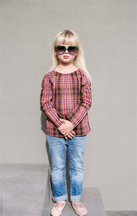 Portrait Of Adorable Little Girl Wearing Sunglasses By Stocksy