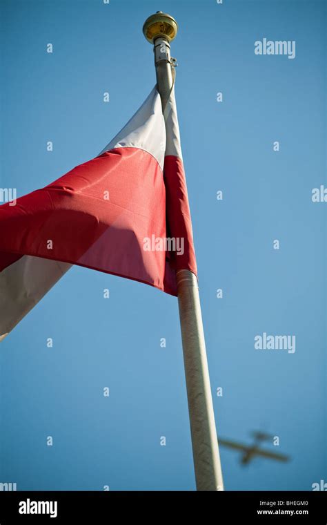 Waving Polish Flags On Blue Sky Stock Photo Alamy