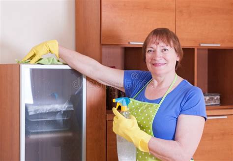 Mature Woman Vacuuming Stock Image Image Of Perso People 62568551
