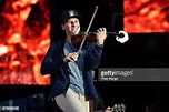 Jimmy De Martini of Zac Brown Band performs on stage during the "Down ...
