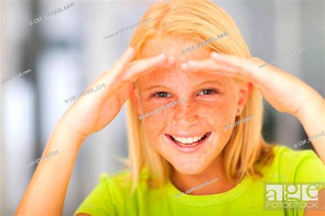 Happy Pre Teen Girl Looking Stock Photo Picture And Low Budget