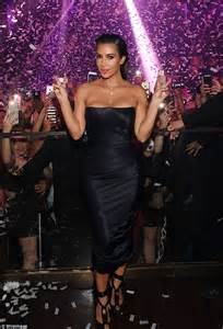 Kim Kardashian Shows Off Her Hourglass Figure In A Strapless Silk Dress