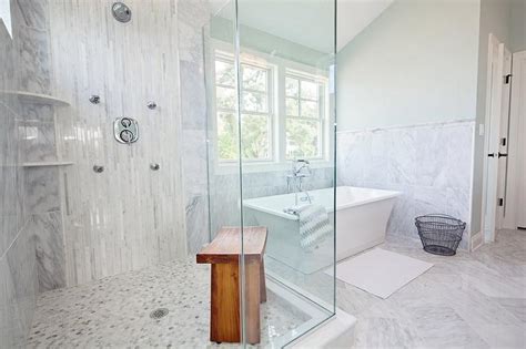 Note that tile for the shower floor is a separate rating from tile for the shower wall. Corner Shower with White Glass Tiles - Cottage - Bathroom
