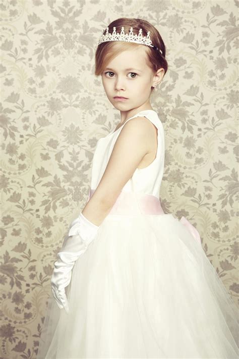 First communion hairstyles simple and laidback styles from short styles with pinned back curls pinned back to hair decorated with a single flower, a simple and. 28 Easy First Communion Hairstyles for Girls That Stole Our Heart - Hair Glamourista