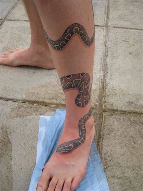 Get some snake tattoo design inspirations for your next inking? Cobra snake tattoo rounding on leg | Leg tattoos, Thigh ...