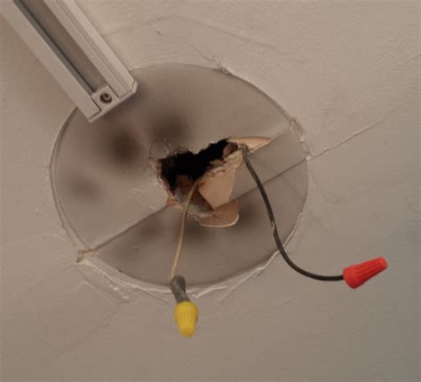 Depending on the type of light fixture purchased, you may have to remove the bracket attached to the junction box. electrical - Installing a fixture with no ground, no ...