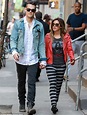 He fits the mould! Smiling Ashley Tisdale holds hands with boyfriend ...