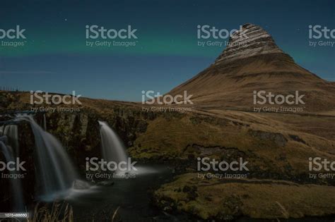 Beautiful Kirkjufell Mountain And Kirkjufellsfoss On The Snaefellsnes