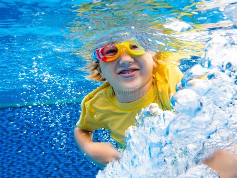 Child Underwater In Swimming Pool Kids Swim Stock Photo Image Of