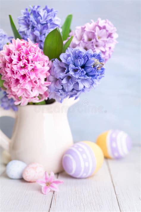Bouquet Of Spring Flowers And Easter Eggs Stock Photo Image Of