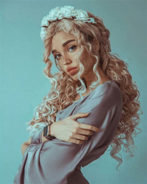 Aquamarine is a full coverage turquoise blue hair color. #hair #curly #flower | Art reference photos, Portrait ...
