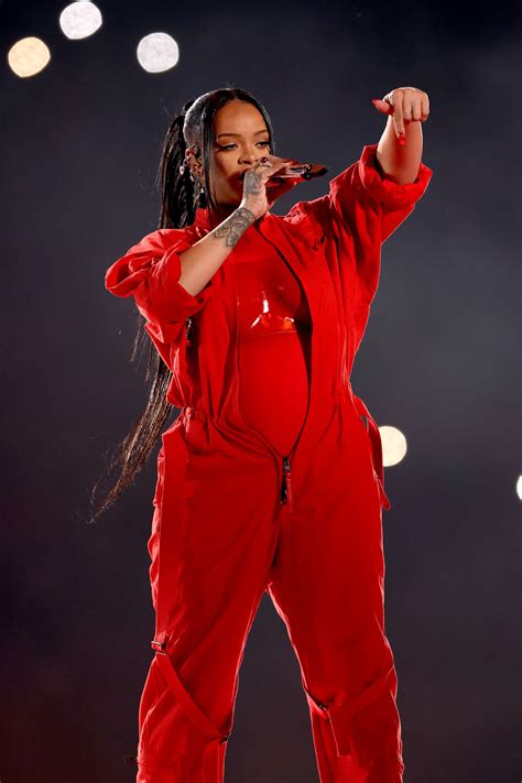 rihanna s super bowl 2023 halftime show outfit included many layers — see photos teen vogue