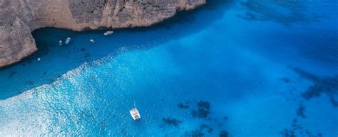 Aerial View Of Boat In Body Of Water Free Image Peakpx