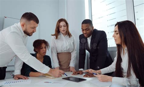 Diverse Team Having Business Conference In Office Stock Image Image