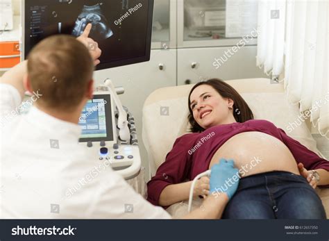 Doctor Patient Ultrasonic Equipment During Ultrasound Stock Photo