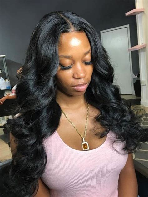 This style was a variation of a greaser with an addition of a middle part in the back. 2019 Long Middle Part Body Wave Synthetic Wig | Rosegal.com