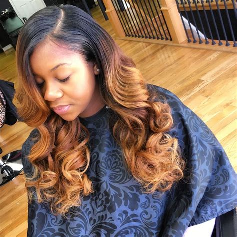 Brown And Blonde Highlights And Sew In Deep Side Part