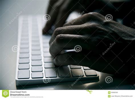 Young Man Typing In A Computer Keyboard Stock Image Image Of Horse