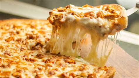Why American Style Pizza Cheese Browns More Than Italian Style