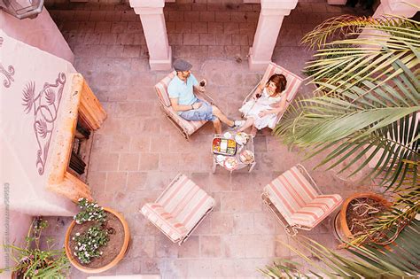 Overhead Photo Of A Happy Couple Eating Brunch In A Fancy Place By