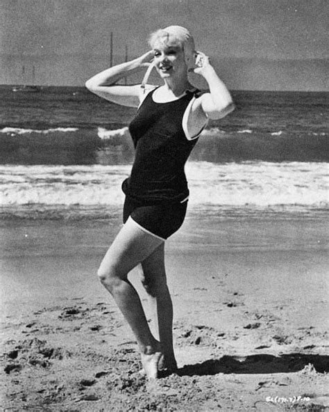 Candid Photographs Of Marilyn Monroe In Black Swimsuit From The