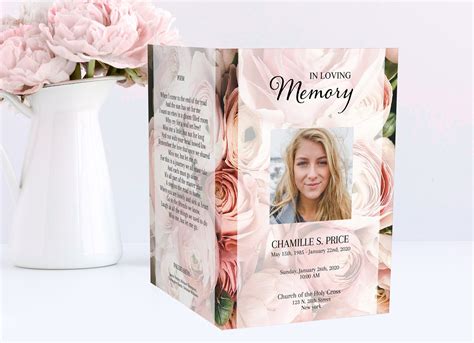 A Funeral Program Booklet With Pink Flowers In The Background And A