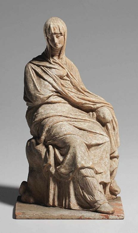 A Greek Terracotta Figure Of A Woman Tanagra Hellenistic Period Circa