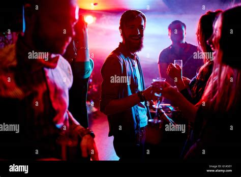 Friendly People With Champagne Enjoying Party Stock Photo Alamy