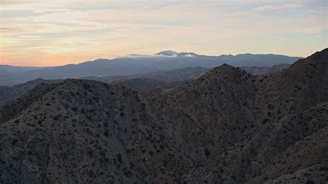 5k Stock Footage Aerial Video Fly Over Desert Mountains Mojave Desert