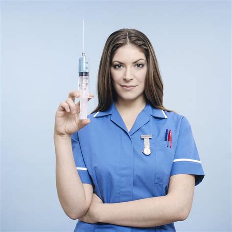 Nurse With Syringe Photograph By Kevin Curtis