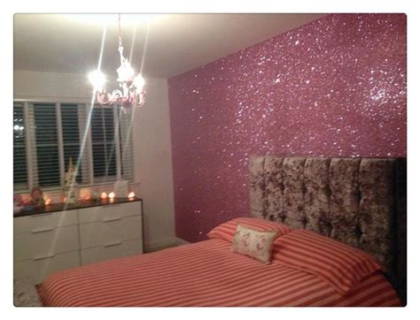 A Bedroom With Pink Glitter On The Walls