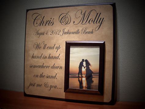 Golden wedding ring in vintage gold picture frame on sand beach many colorful empty picture frame hanging or isolated on black rough black wall for decoration festival, event or wedding party in. Custom Wedding Picture Frame Personalized by YourPictureStory