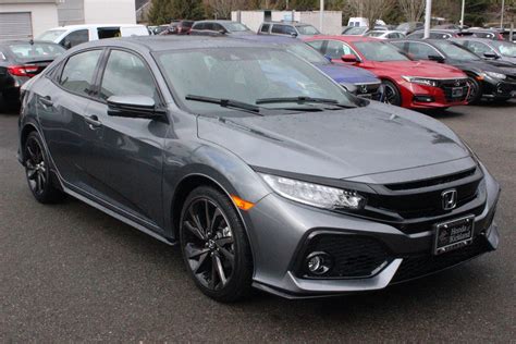 Sport touring adds led headlights, heated rear outboard seats, an aero kit and sport pedals. New 2019 Honda Civic Hatchback Sport Touring Hatchback in ...