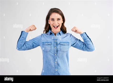 Confident And Strong Woman Showing Her Bicep Stock Photo Alamy