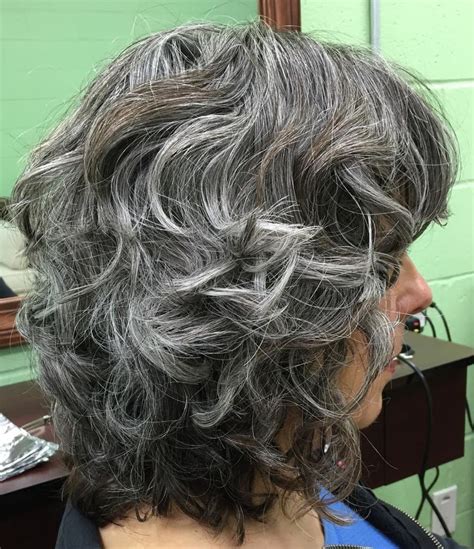 Medium Layered Hairstyle With Gray Highlights Grey Curly Hair