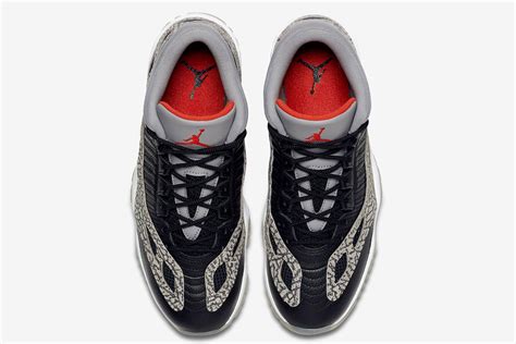 Air Jordan 11 Ie Low Black Cement 919712 006 Release Date Nice Kicks