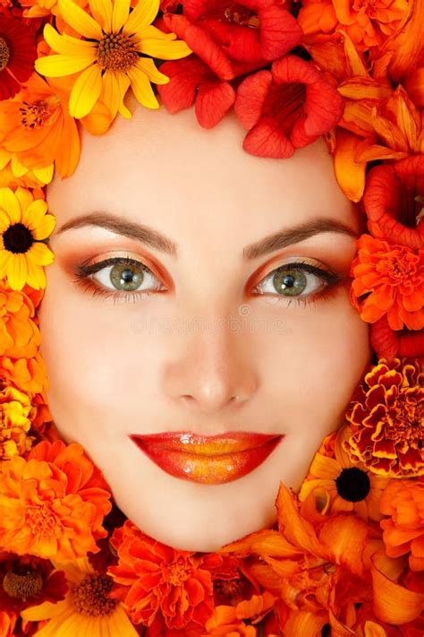 Beauty Portrait Of Beautiful Female Face With Orange Flowers Stock