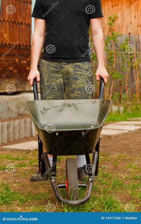 Man With Wheelbarrow Stock Photo Image Of Garden Clothes