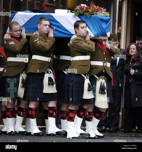 The coffin of Private Scott McArdle is carried during the funeral