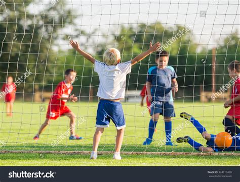 Boy Football Team Celebrating Stock Photo 324113420 Shutterstock