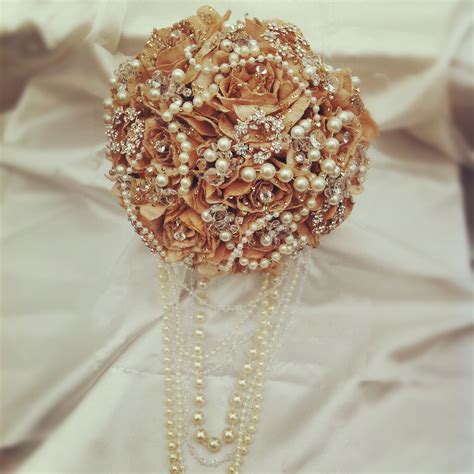 A Beautiful Golden Rose Bouquet With Trails Of Pearls Diamontes