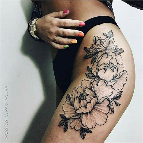 Outline Black Flower Tattoo On The Leg