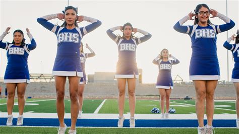 This High School Cheer Squad Is Caught Between Two Worlds—divided By A