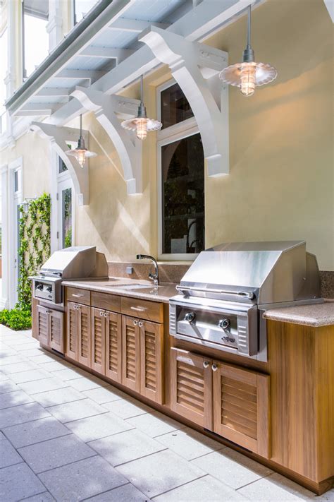 A full roof, as used here, is one option; 95 Cool Outdoor Kitchen Designs - DigsDigs