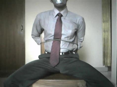 Man In Tuxedo Tied To A Chair And Gagged With Duct Tape Hoodoo Wallpaper