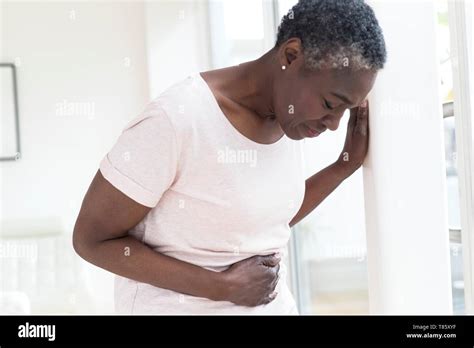 Woman Tummy Ache Hi Res Stock Photography And Images Alamy