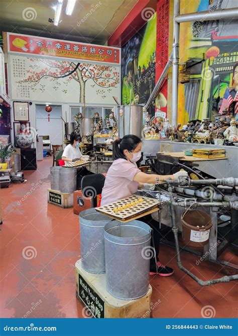Women Making Fortune Cookies At Golden Gate Fortune Cookie Company Chinatown San Francisco