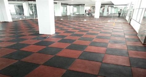 General i'm putting a gym in the basement and would like to use rubber floor tiles. Plain 2x2 Rubber Flooring Tile, Thickness: 10-15 mm, Size ...