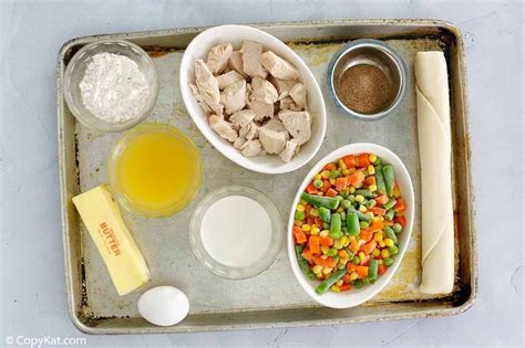 Unwrap frozen pot pies and arrange on a rimmed baking sheet. Chicken Pot Pie with Frozen Vegetables | CopyKat Recipes